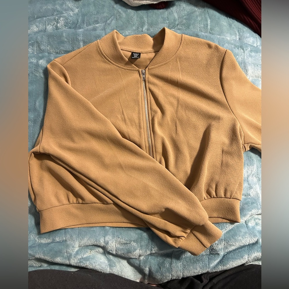 This is a light and appealing jacket. Never been warn!!